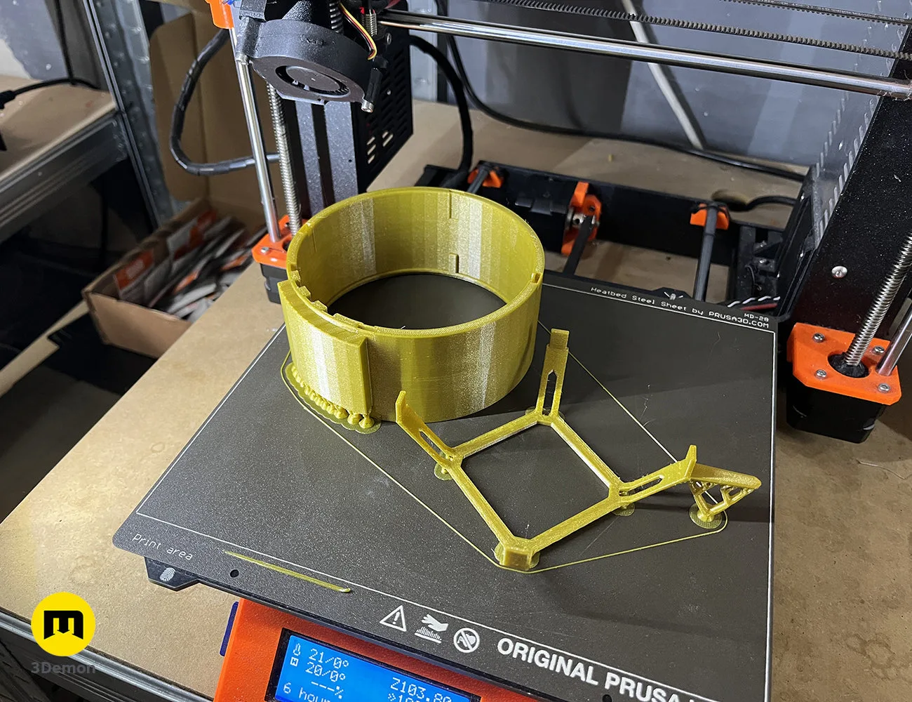 Close-up of 3D printed hextech rifle iris chamber mechanism with gold inserts cosplay STL prop