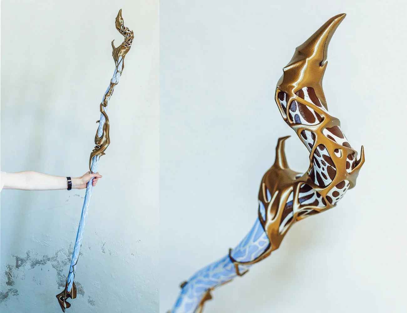 Lifestyle photo hand-held view of printed Viktor Arcane Hex Staff mechanical head showing intricate bronze metallic cage structure with glowing purple hextech crystal at the center