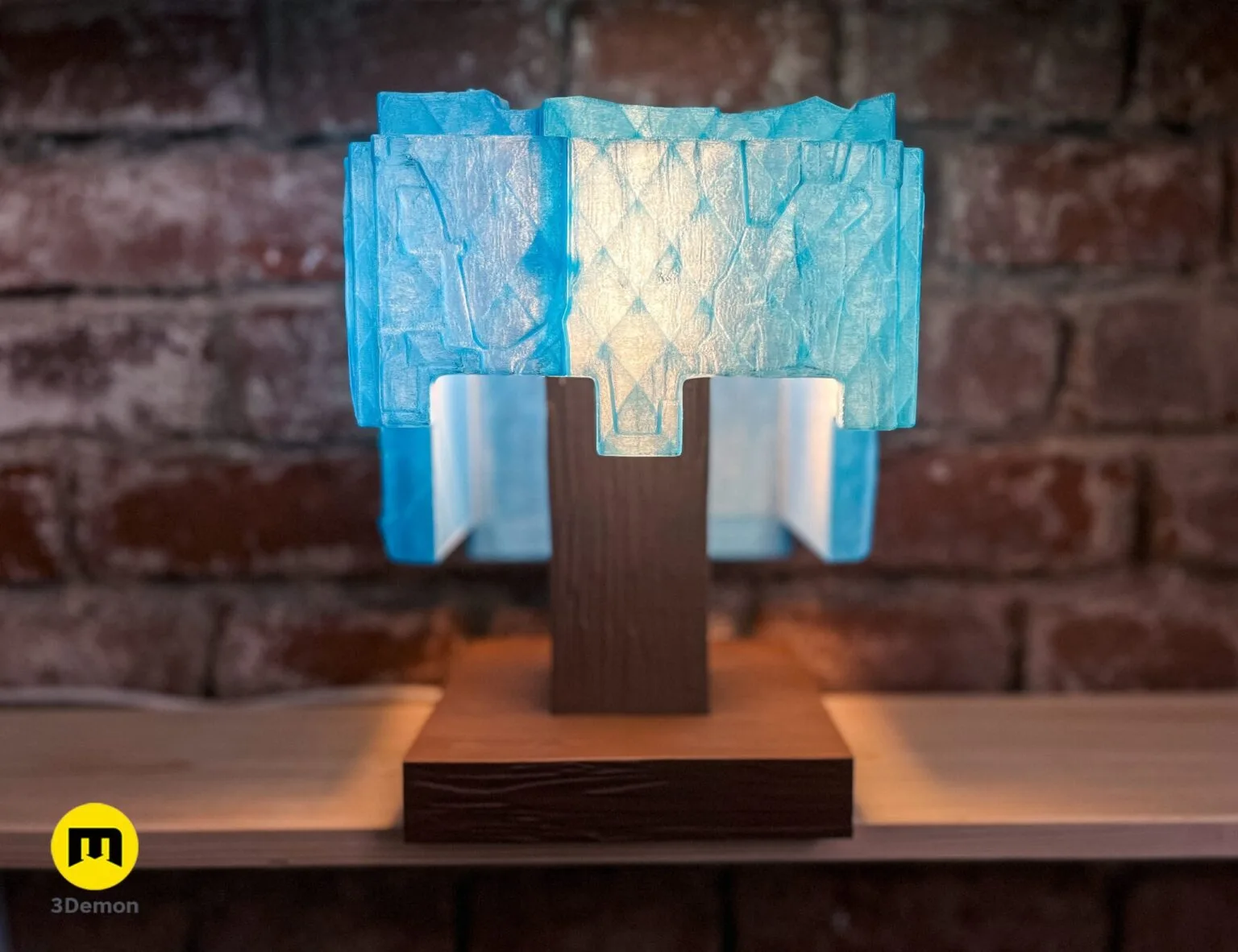 Close-up lifestyle photo of glowing Minecraft movie diamond helmet lamp on wooden blocky stand showing vibrant blue internal light through translucent pixel cubic surface
