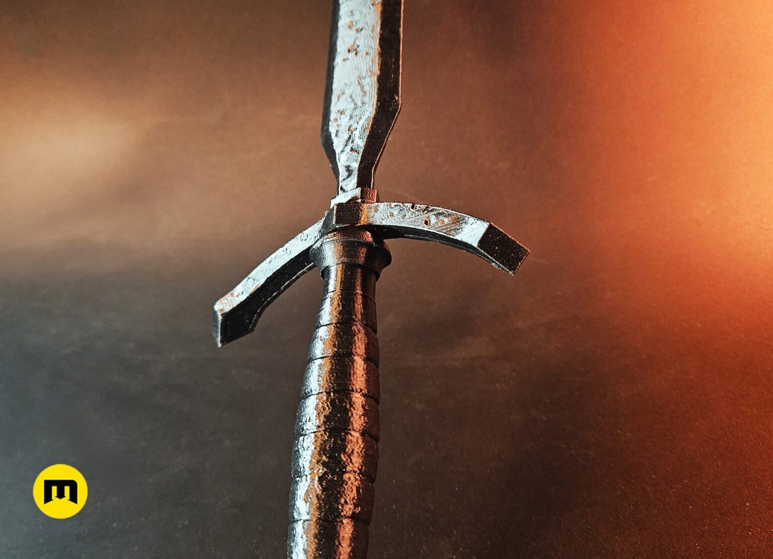 Close-up photo of assembled unpainted 3D printed Expedition 33 Verso Dagger Verleso crossguard and ribbed grip area on green mat highlighting 3D printed texture detail