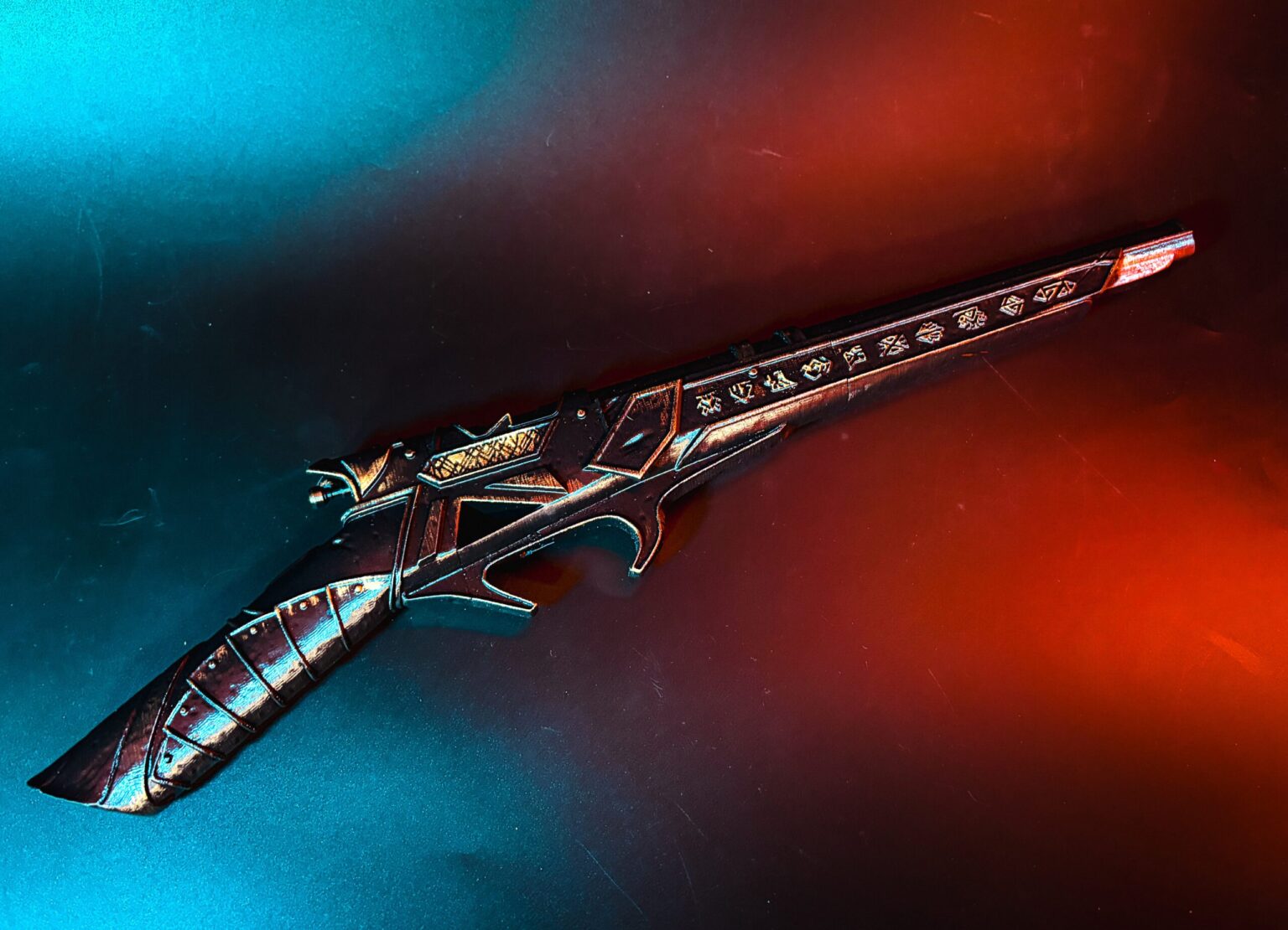 Lifestyle person holding Expedition 33 Gustave Gun against white wall showing matte black body with ornate gold Art Nouveau runic filigree on grip and frame cosplay prop