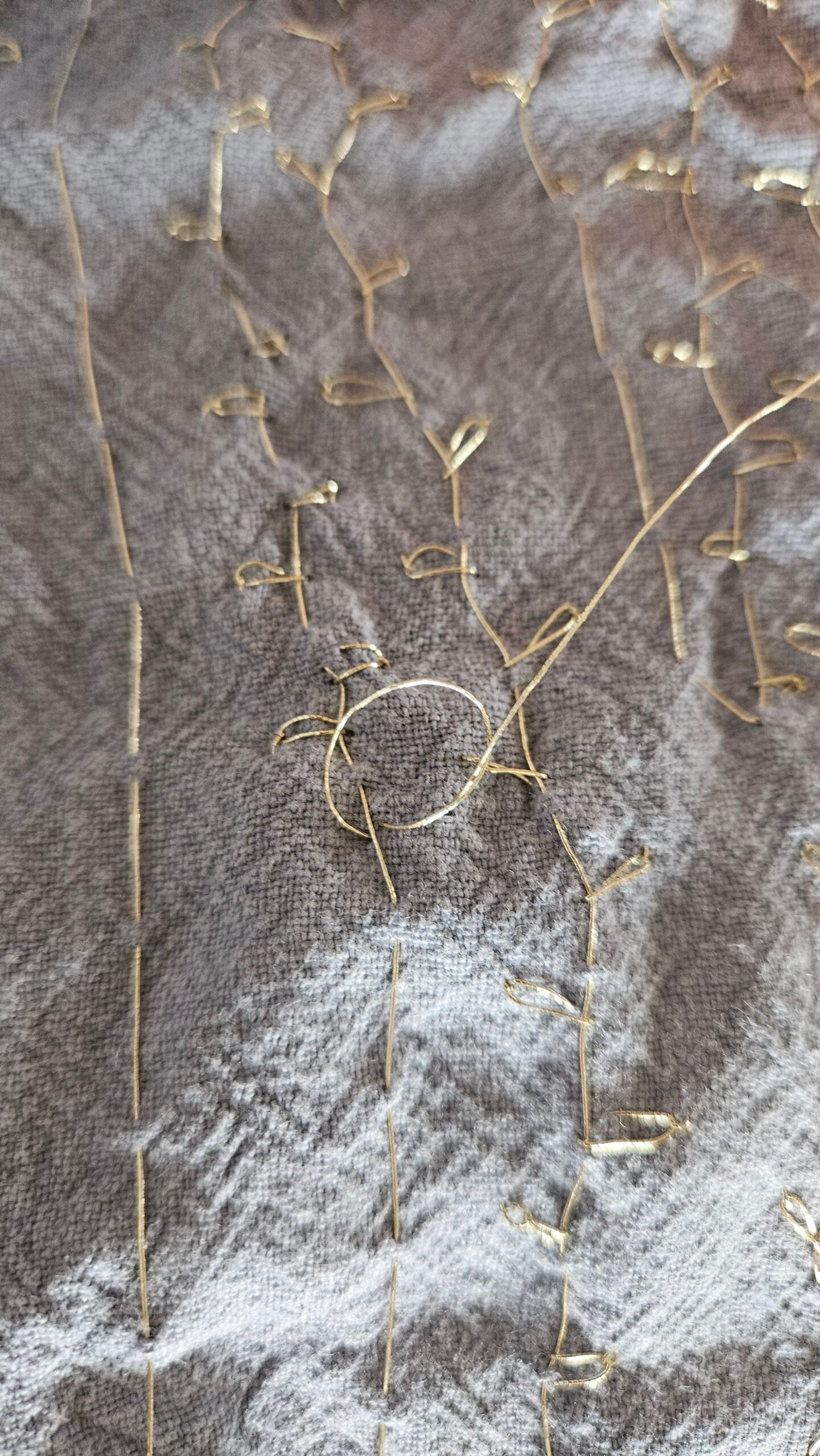 Progress on the hand-sewn gold embroidery pattern