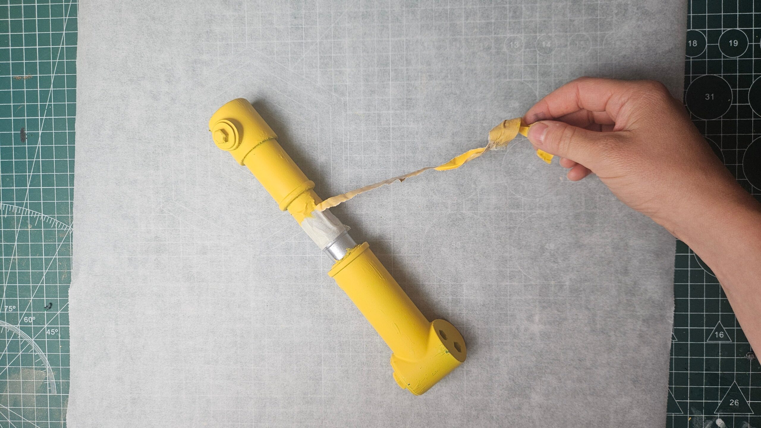 3D printed Lucy Power Fist cosplay prop from Fallout – Yellow spray paint, step photo 3