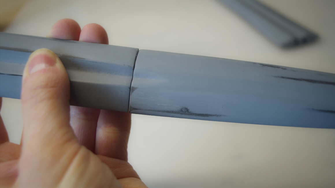 Eowyn cosplay from Lord of the Rings with a 3D printed sword and handsewn refugee dress – Gluing the blade, step photo 2