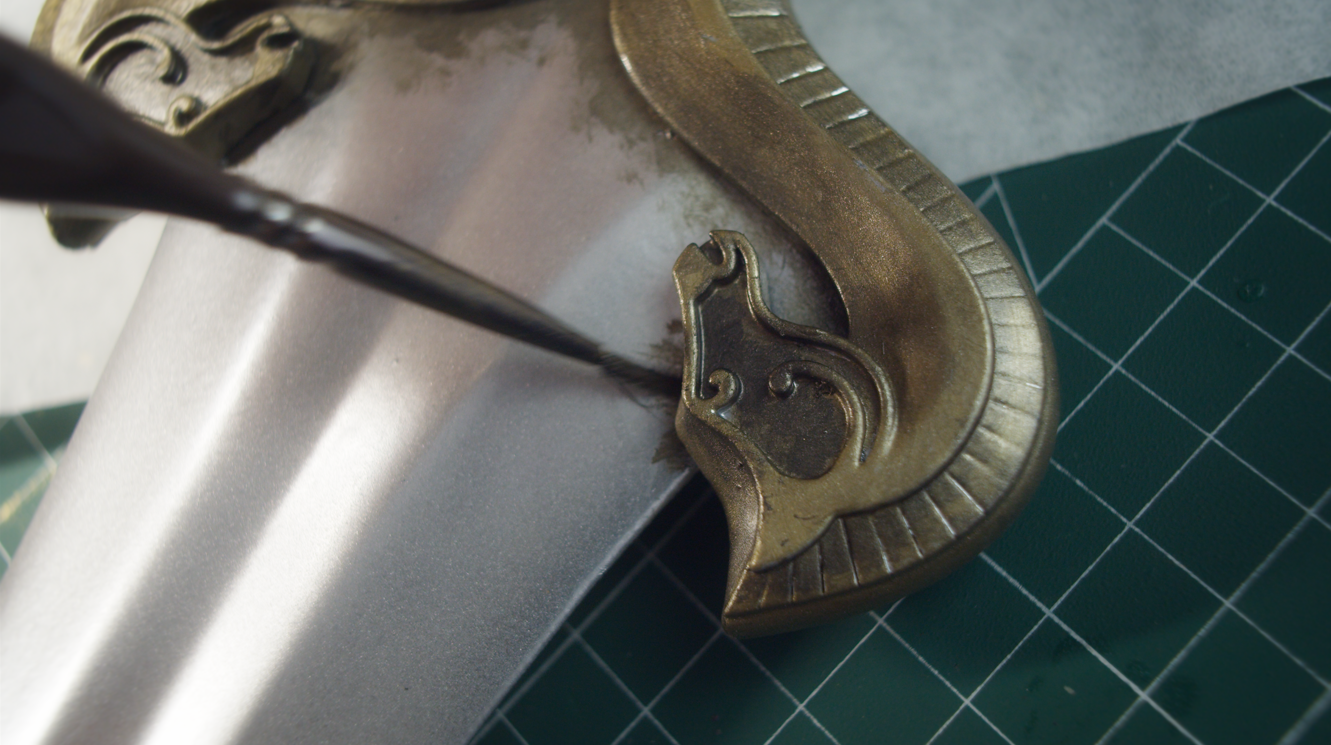 Final detail brushwork on the finished Éowyn sword hilt