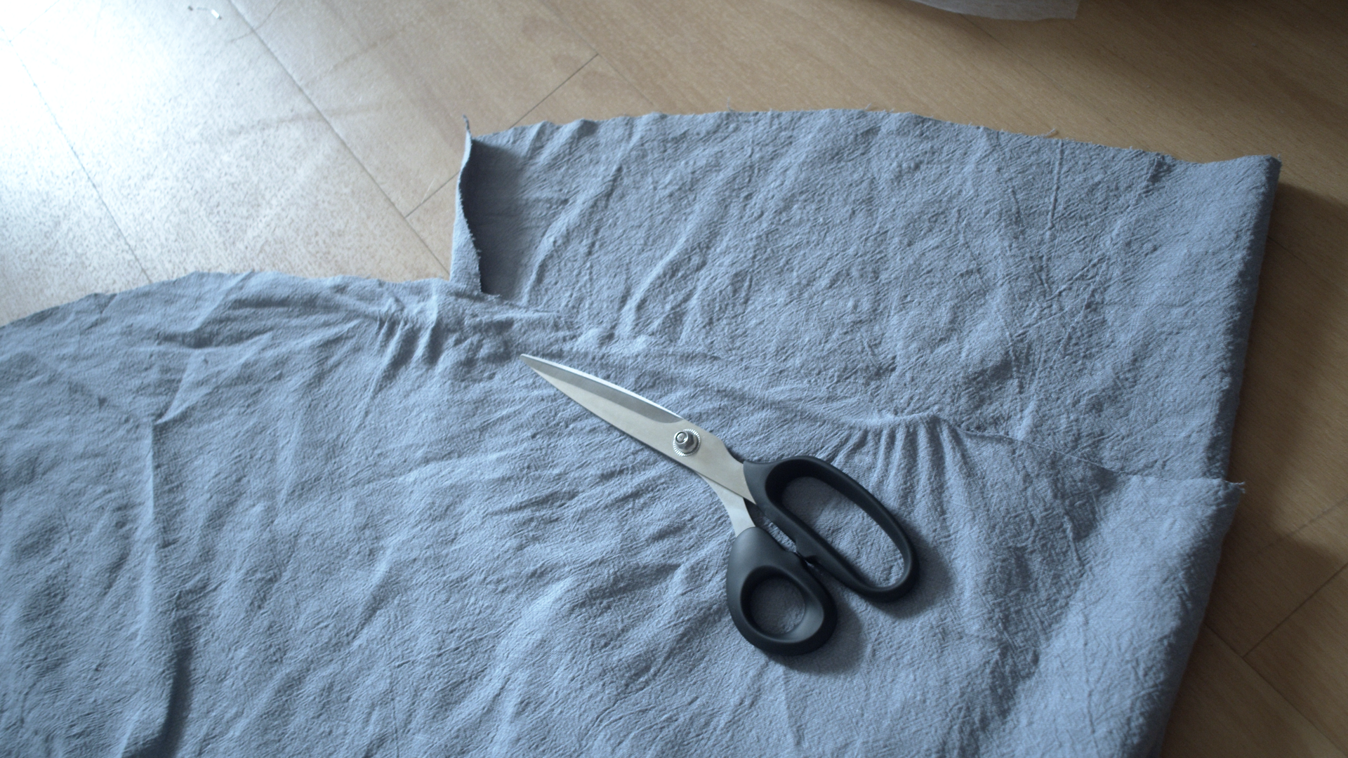 Trimming the seam allowance on the blue dress