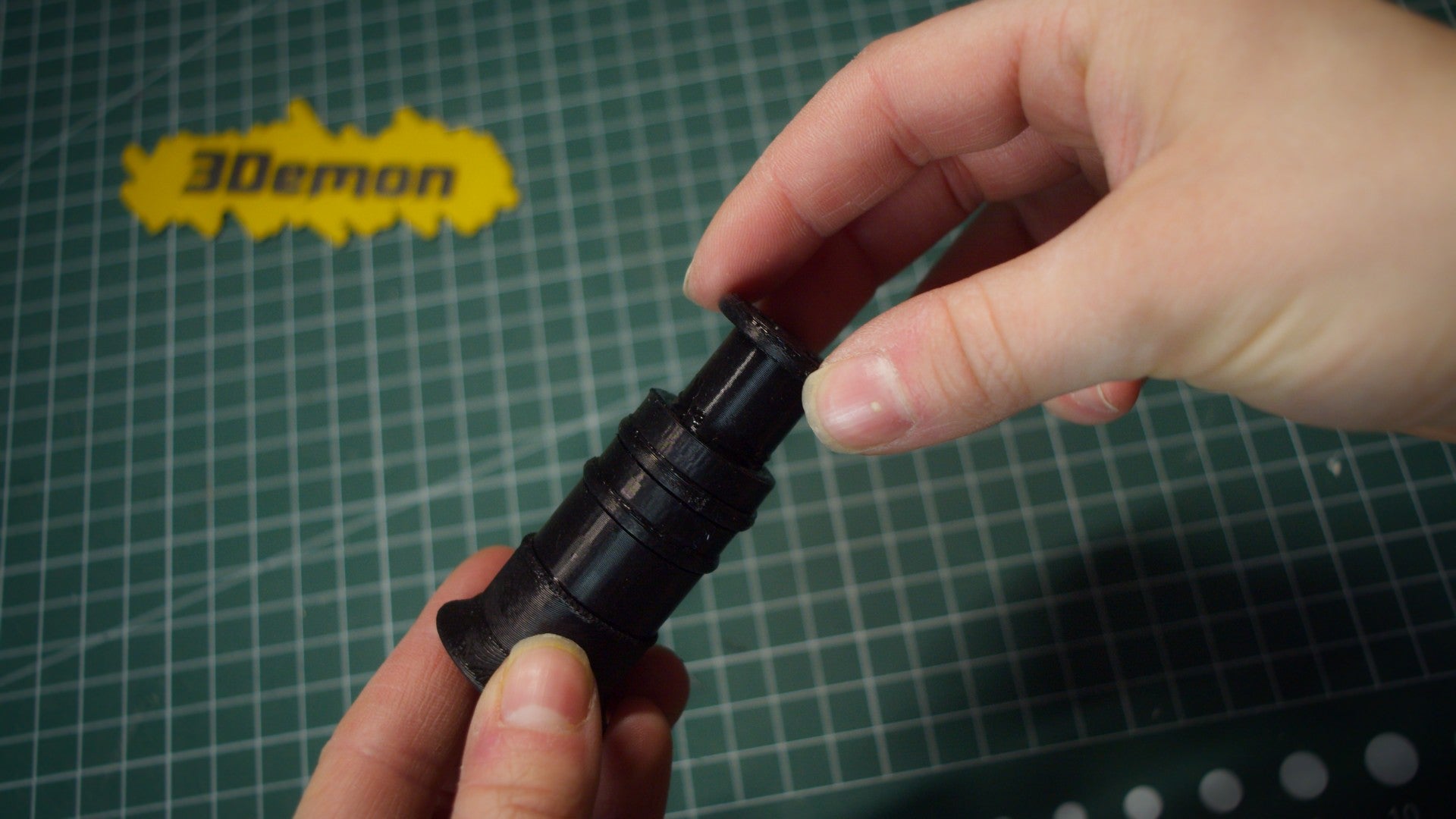 Gluing the 3D printed hilt sections of the sword together