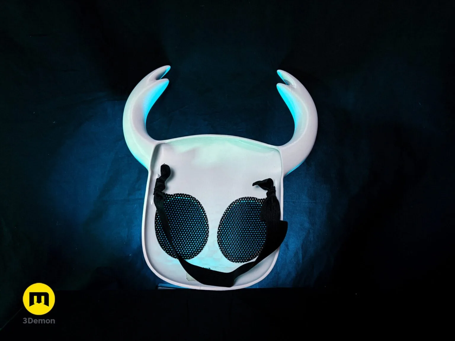 Back view of 3D printed Hollow Knight Ghost Face Mask showing black elastic strap and mesh eye covers