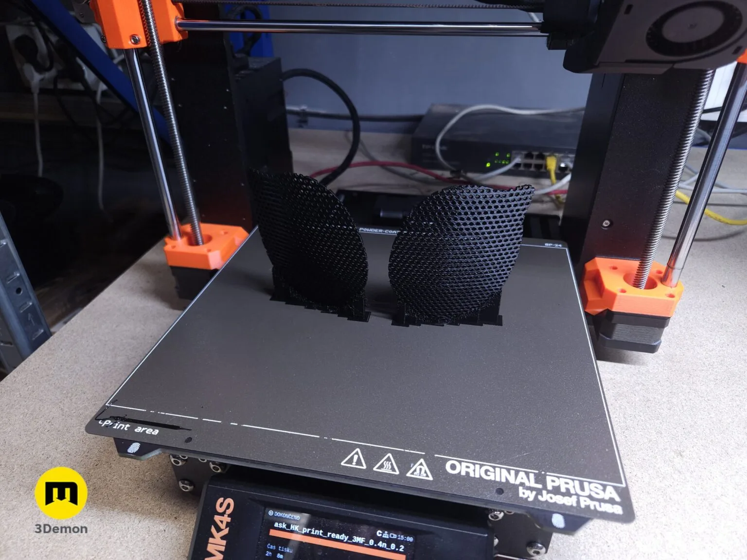 Close-up of black honeycomb mesh eye inserts for Hollow Knight Ghost mask freshly printed on Prusa MK4S