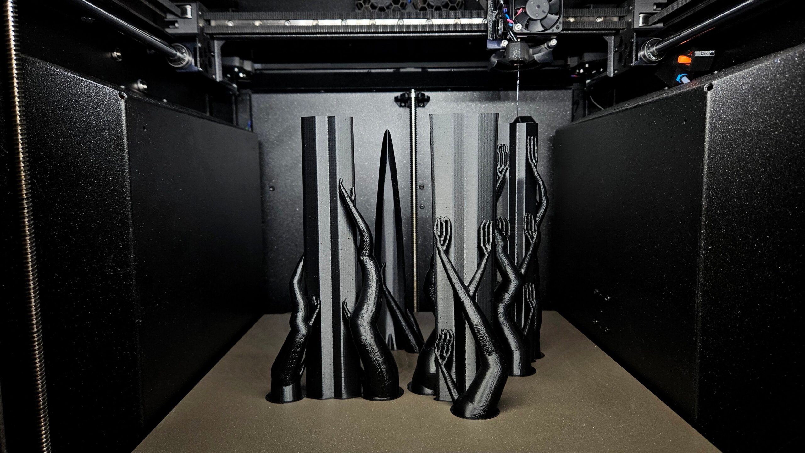 Sword blade sections printing in black ABS filament on a Prusa 3D printer