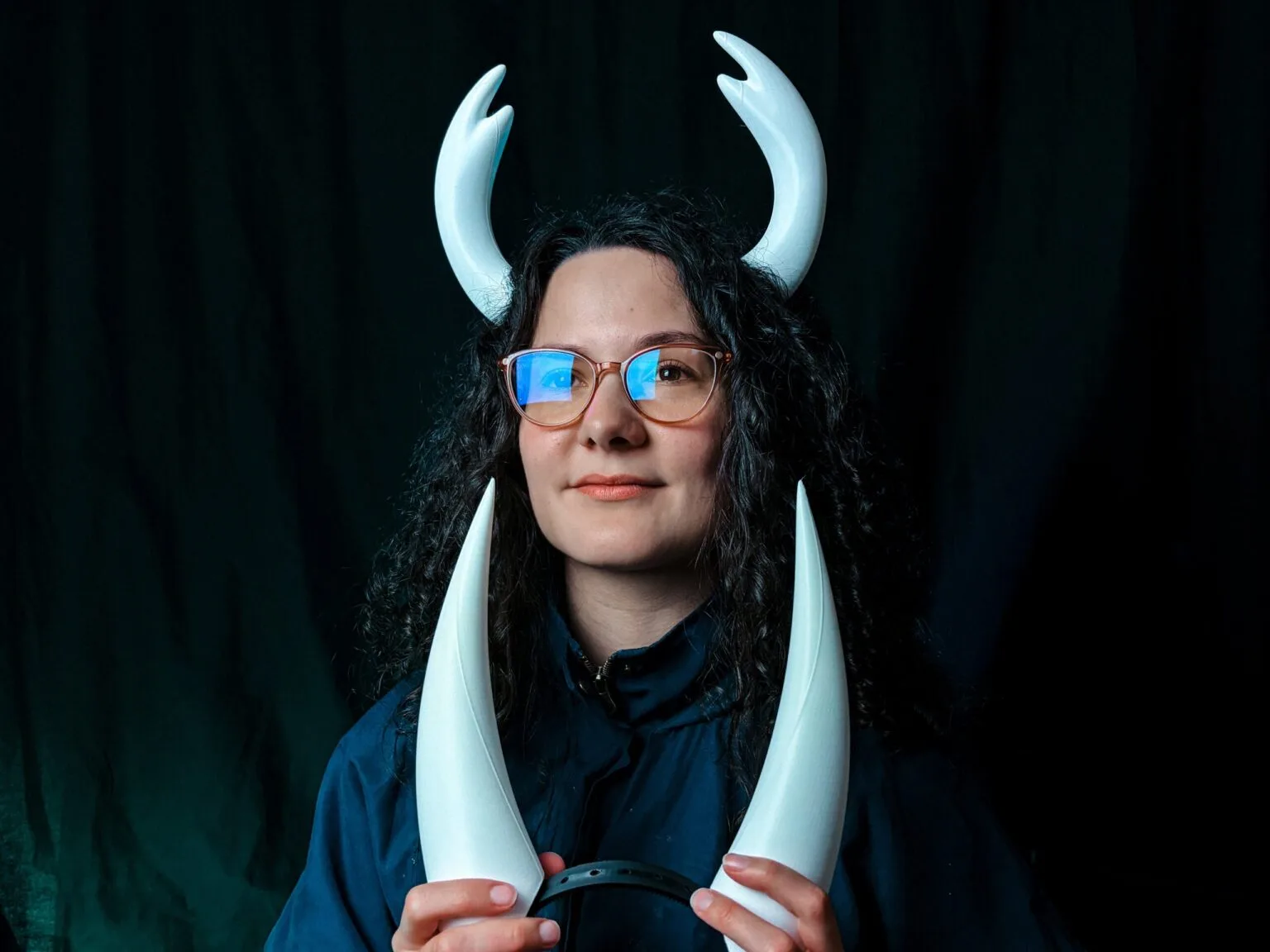 Lifestyle photo of 3D printed Hollow Knight Ghost cosplay horns headband worn by person front view