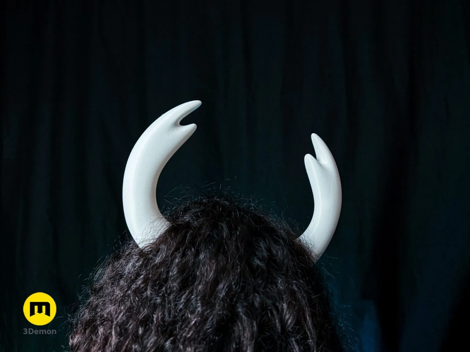 Lifestyle photo of 3D printed Hollow Knight Ghost horns cosplay headband three-quarter view