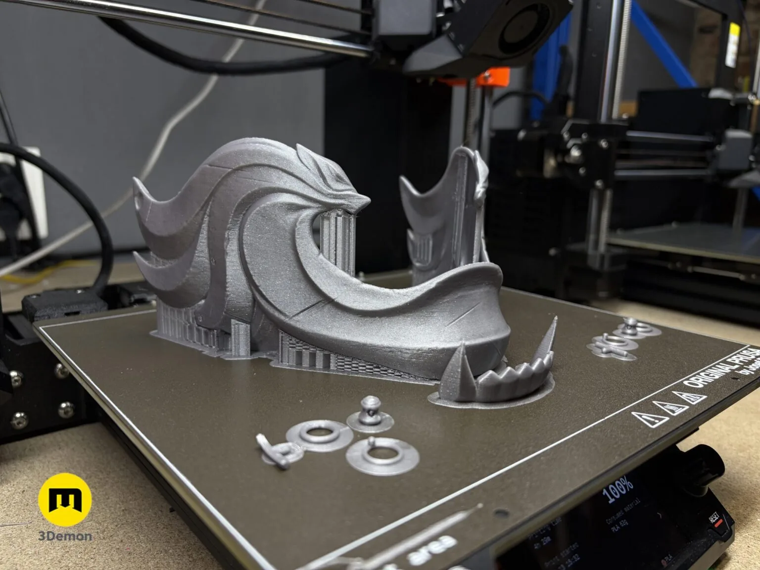 Lifestyle photo of 3D printed Twin Wolves samurai mask from Ghost of Yotei three-quarter view