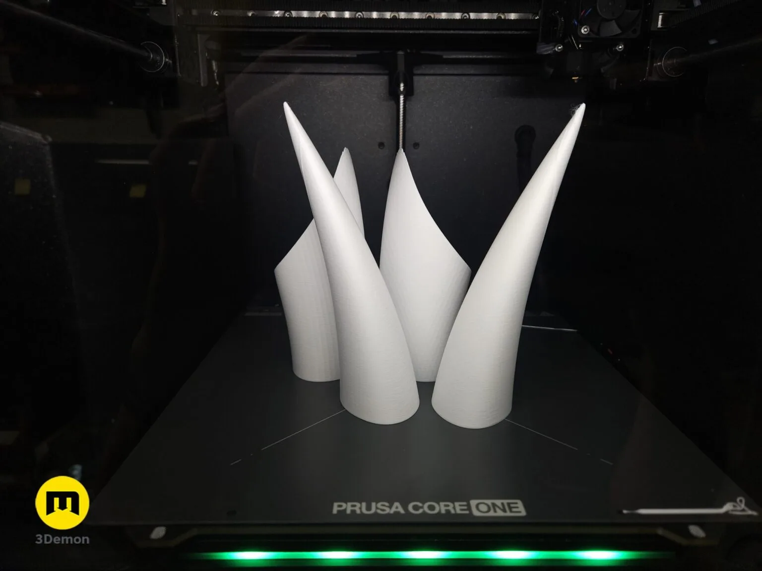 Photo of 3D printed Hollow Knight Ghost and Hornet cosplay horns headband on table